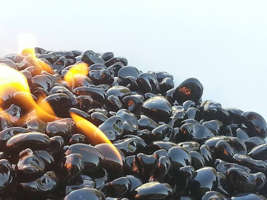 Black fire glass lit closeup